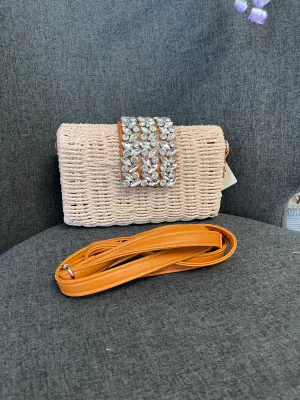 Nicole woven clutch bag