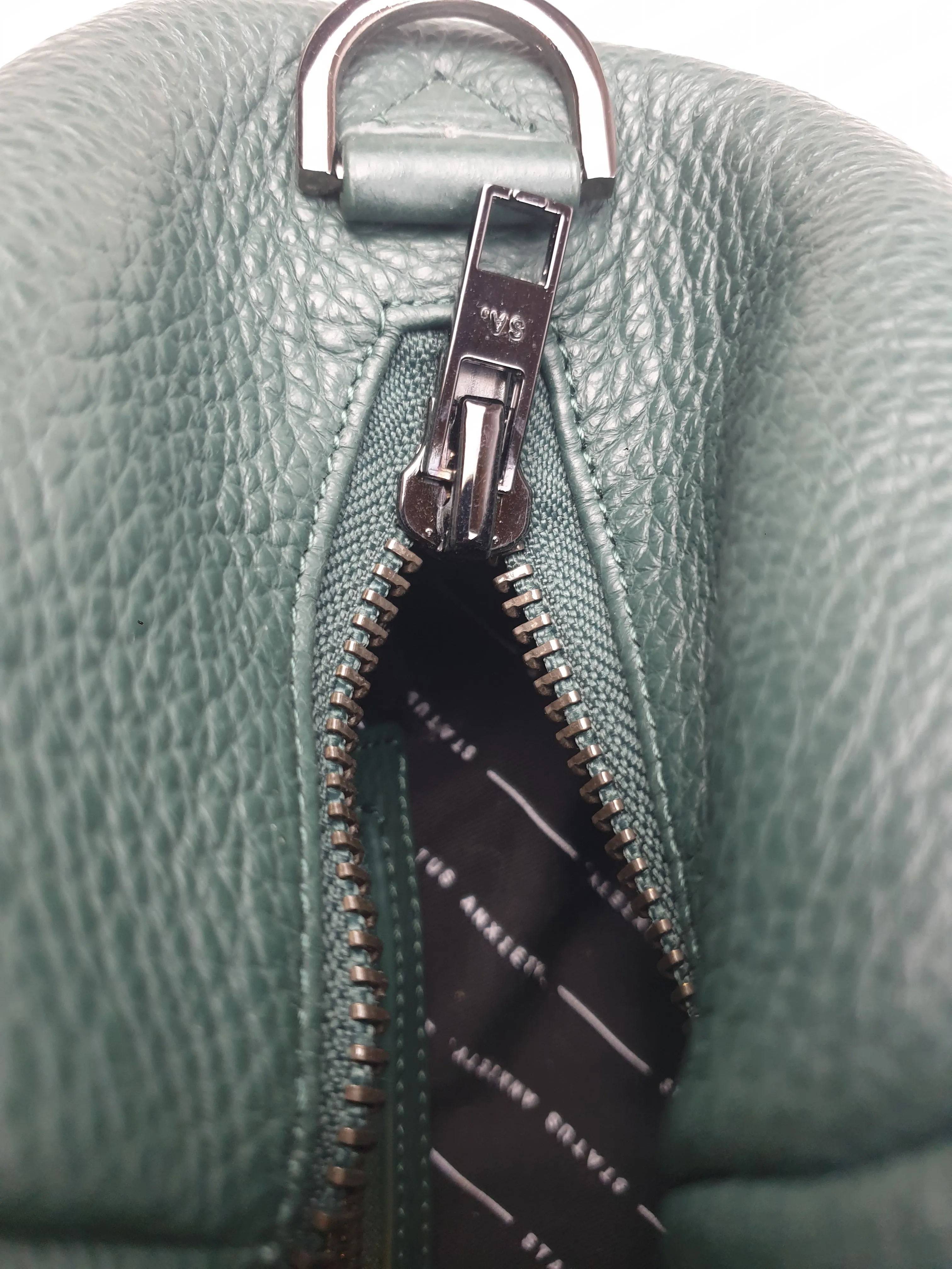 Status Anxiety green leather bag